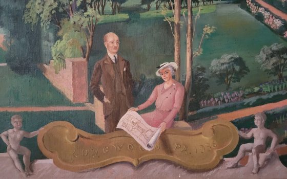 oil painting of two people sitting in a garden with a gold placque that reads Longwood PA 1936