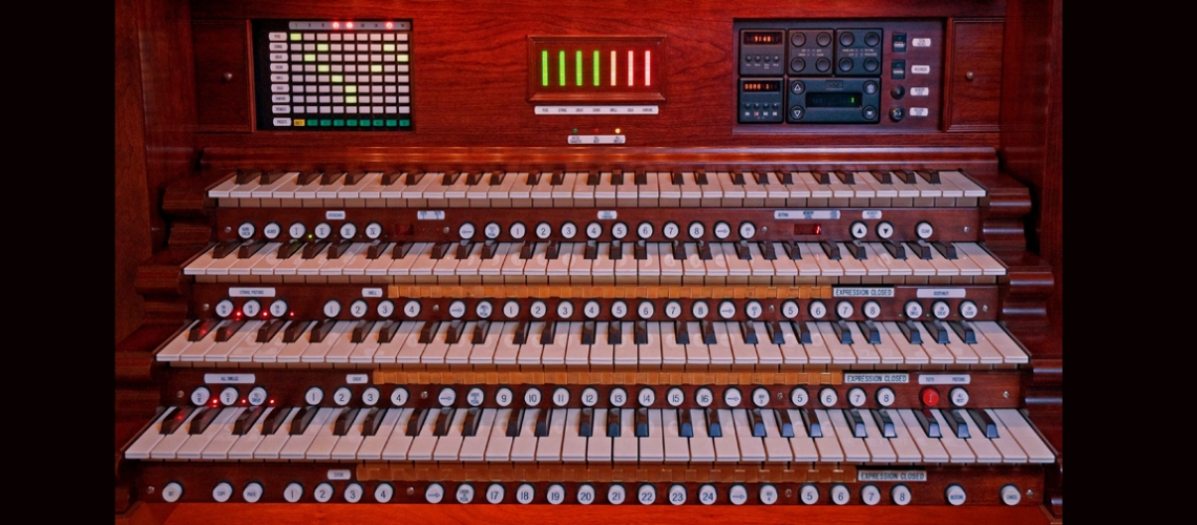 five keyboards on an organ console