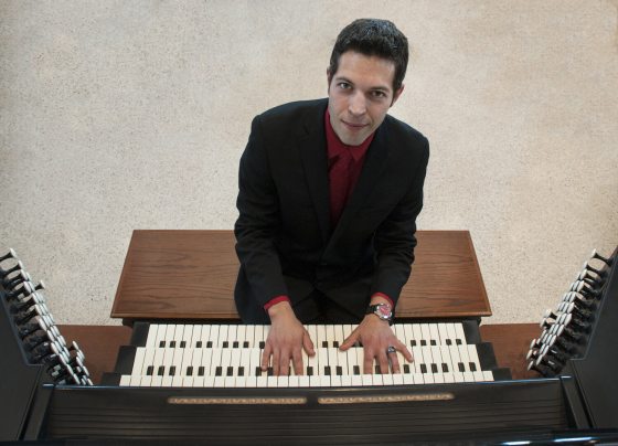 musician playing a keyboard