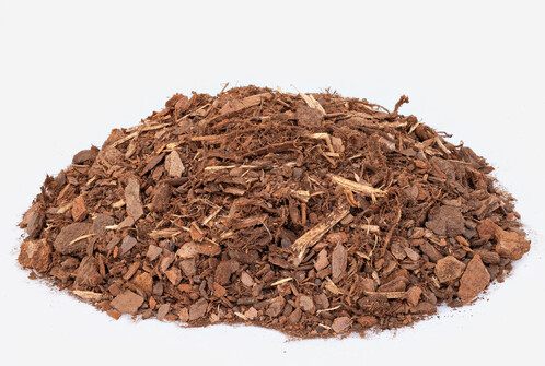 a handful of wood chips on a white background.