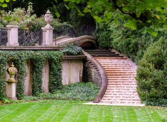 A view of the Italian Water Garden stairs and wall at Longwood Gardens.