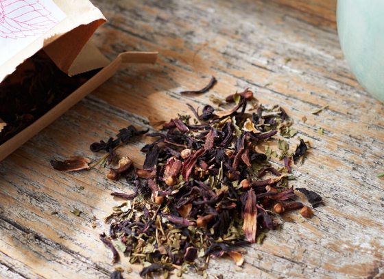Loose leaf tea on a wood table.