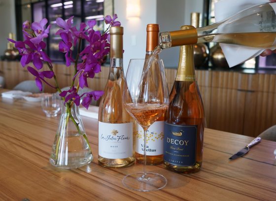 Rose wine being poured into a glass