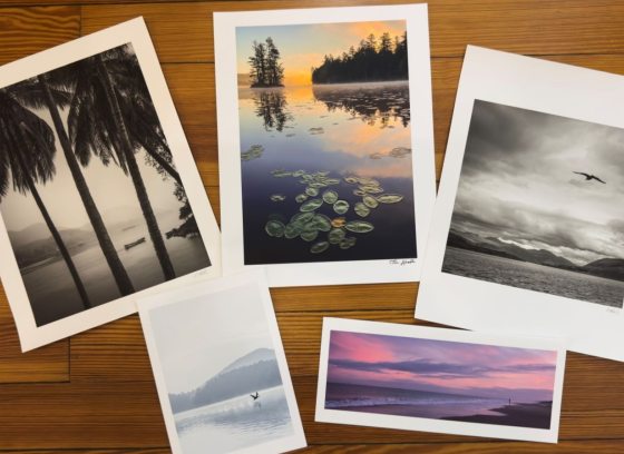 Printed photos on a wood background