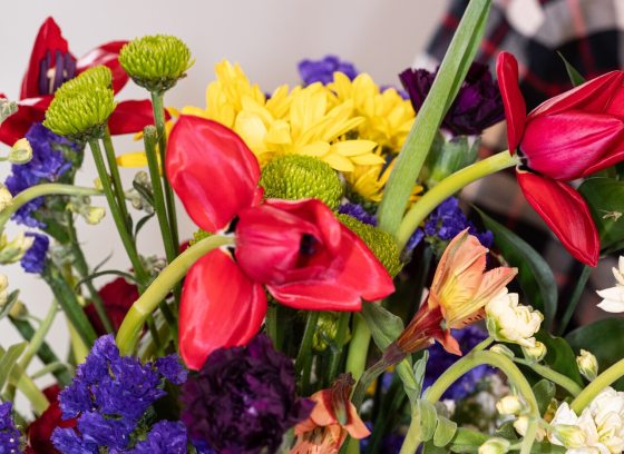The top of an arrangement of vividly colored flowers. 