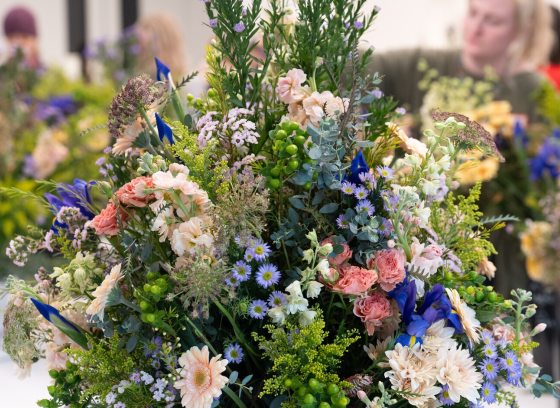 A large scale floral design featuring blue and white blooms.