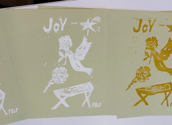 A series of block-printed holiday cards