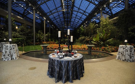 a table set in the evening in the Conservatory