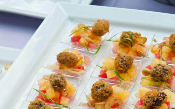 a tray of beautifully arranged and decorated appetizers