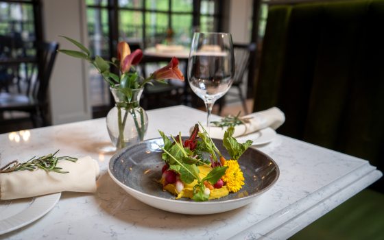 plate of food set on a white table