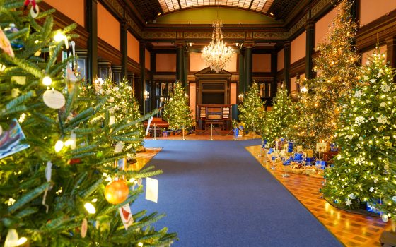 The Ballroom at Longwood Gardens willed with Christmas trees.