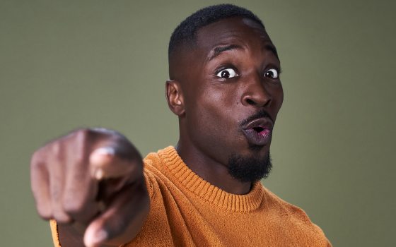 Man pointing at the camera