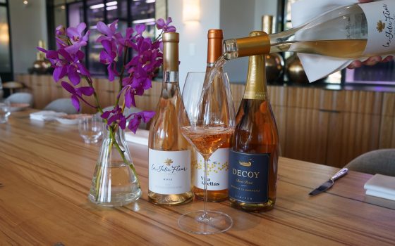 Rose wine being poured into a glass