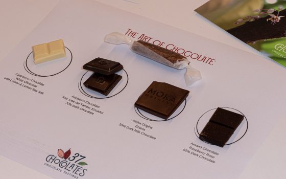 Pieces of chocolate set out on a table.