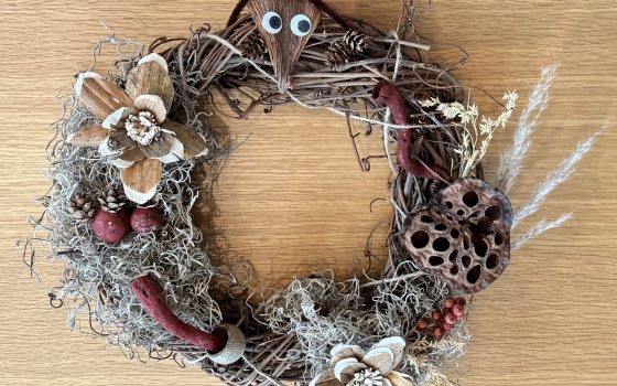 Grapevine wreath decorated with natural materials