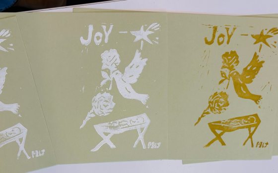 A series of block-printed holiday cards