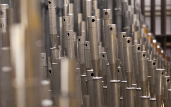 Closeup of array of organ pipes.