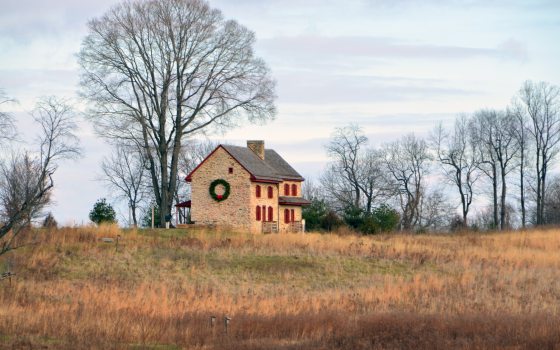 A vista of the Webb Farm House in the Meadow Garden.