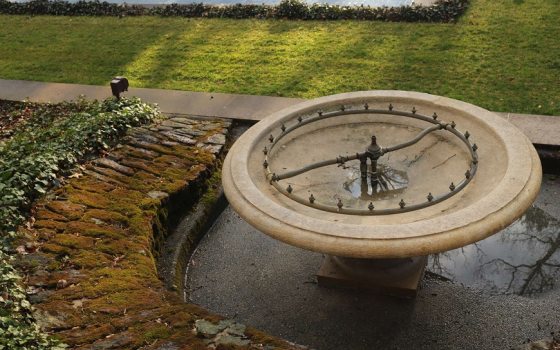 oval outdoor fountain without water 