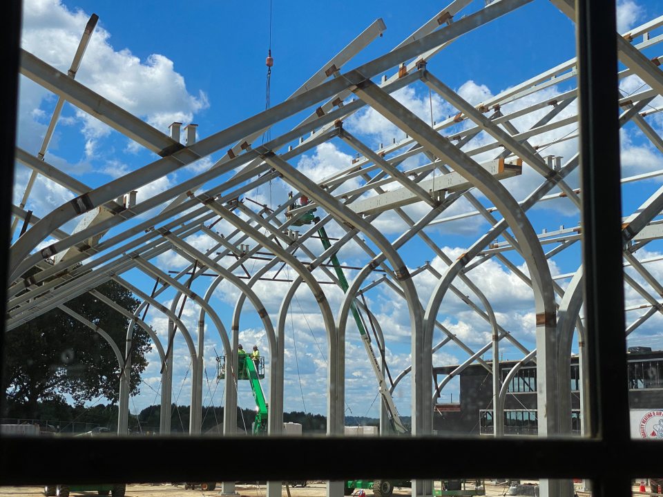steel beams in the shape of arches forming a conservatory