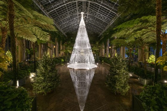White strings with geometric shapes in them, put together to look like a white lit Christmas tree at Longwood Gardens.