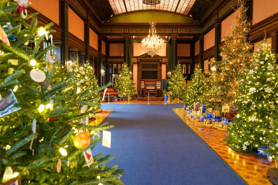 The Ballroom at Longwood Gardens willed with Christmas trees.