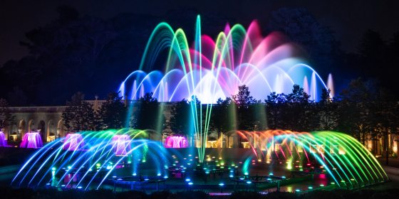 Wide view of multi-colored fountain garden.