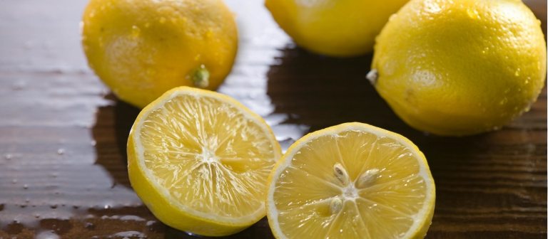 lemons on a brown table