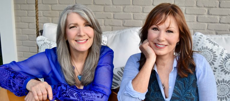 Two adults sitting together