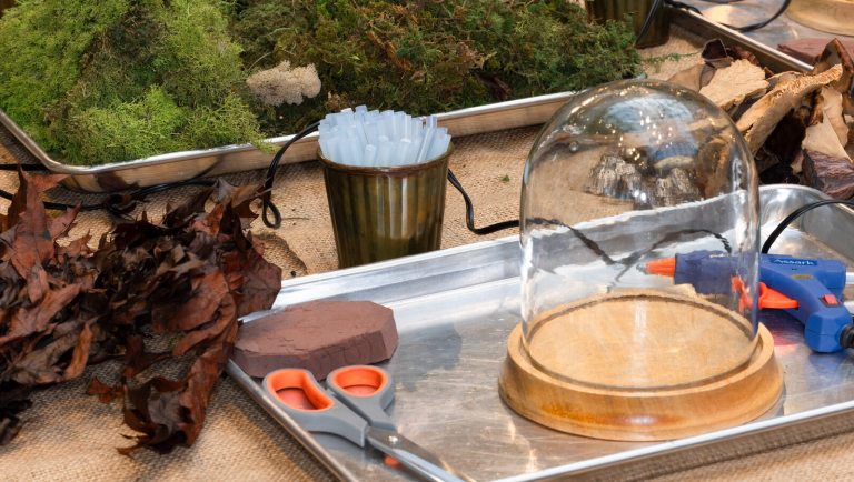 Materials on a table to create a cloche.
