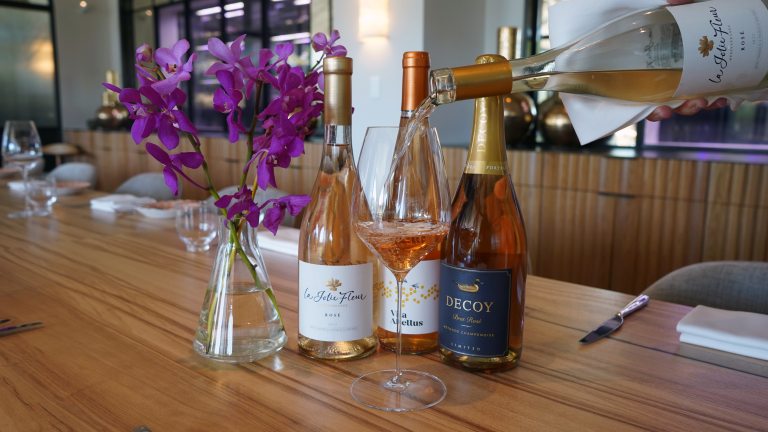 Rose wine being poured into a glass