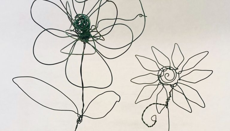 2 flower outlines created with metal wire