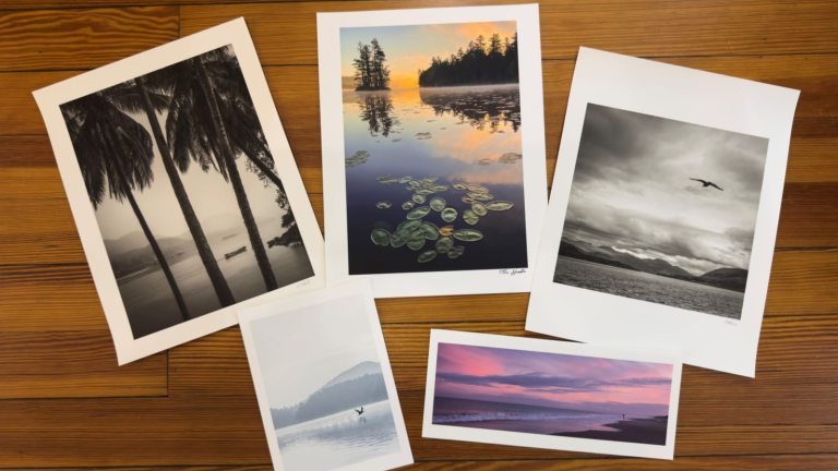 Printed photos on a wood background