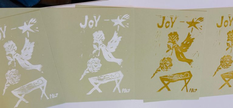 A series of block-printed holiday cards