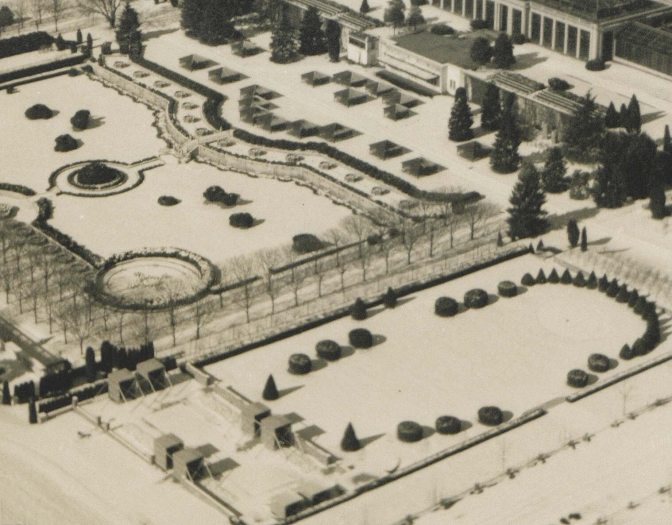 black and white aerial photo of perfectly planned an designed gardens covered in snow