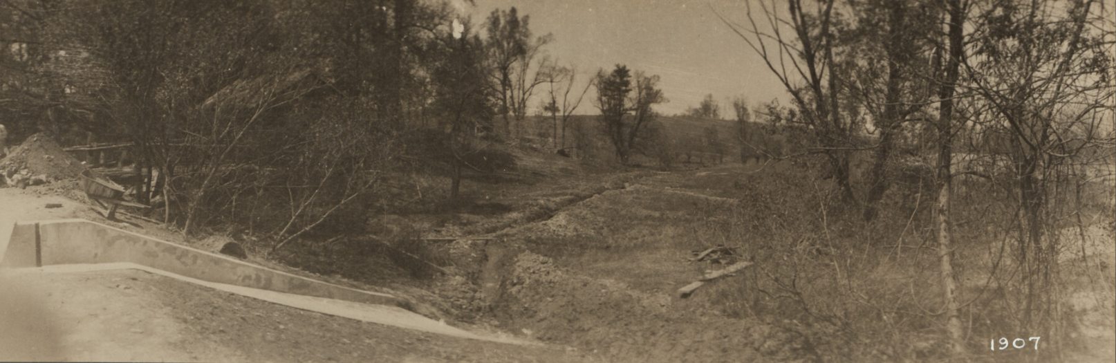 A sepia-toned old photo of a large expanse landscape