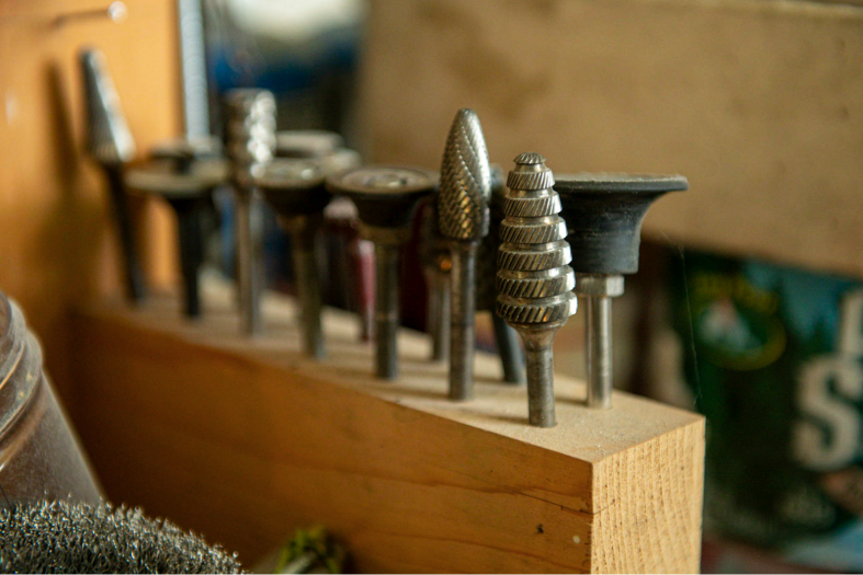 Closeup of metal sculpting tools.