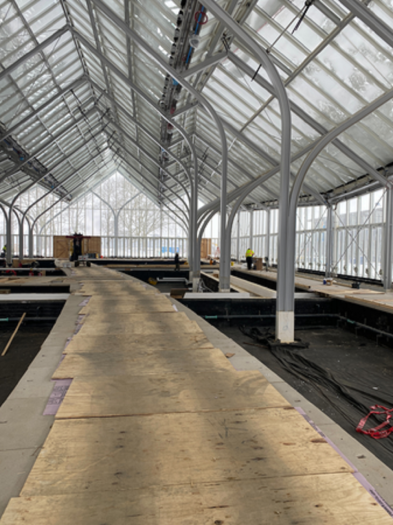 Construction of a walkway inside a glass conservaory.