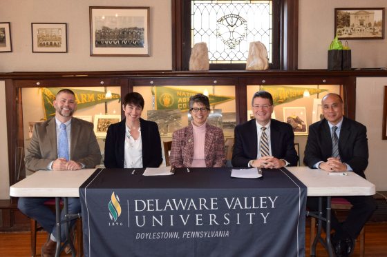 Delaware Valley University. Representatives from Delaware Valley University and Longwood Gardens sign an articulation agreement. From left: Longwood Gardens Director of Domestic and International Studies Dr. Brian Trader, Longwood Gardens Vice President of Education Sarah Cathcart, DelVal President Dr. Maria Gallo, DelVal Vice President for Academic Affairs Dr. Benjamin Rusiloski, and DelVal Vice President for Enrollment Management Art Goon.