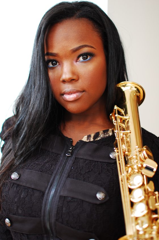 closeup portrait of musician with a saxophone