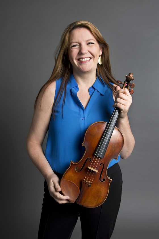 portrait of musician holding a violin