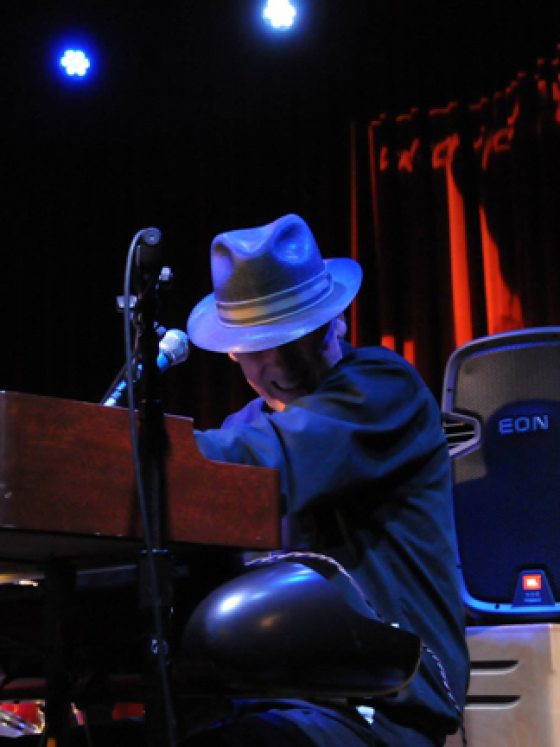 performer playing a keyboard