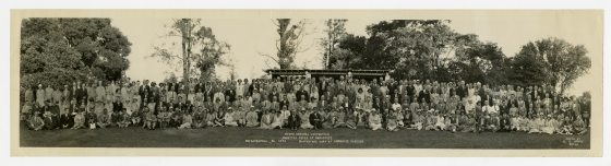 black-and-white wide shot group portrait in an outdoor landscape