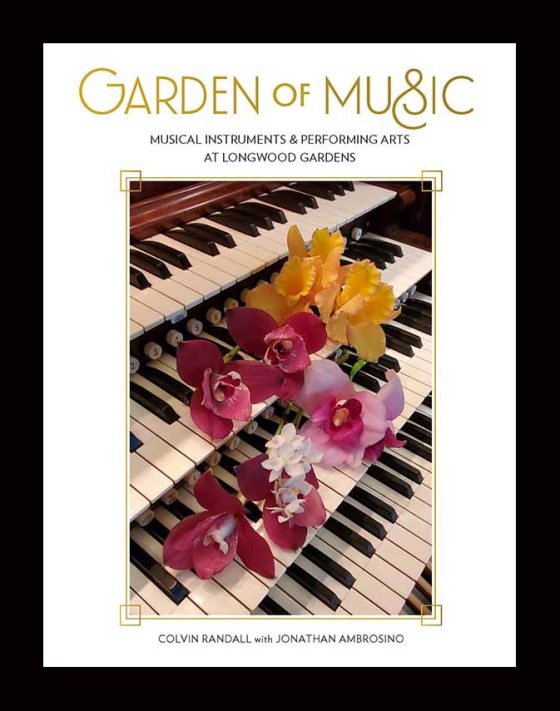 Image of book cover for "Garden of Music" by Colvin Randall with Jonathan Ambrosino, showing closeup of organ keyboard strewn with pink, yellow, and white flowers, with black border added for contrast.