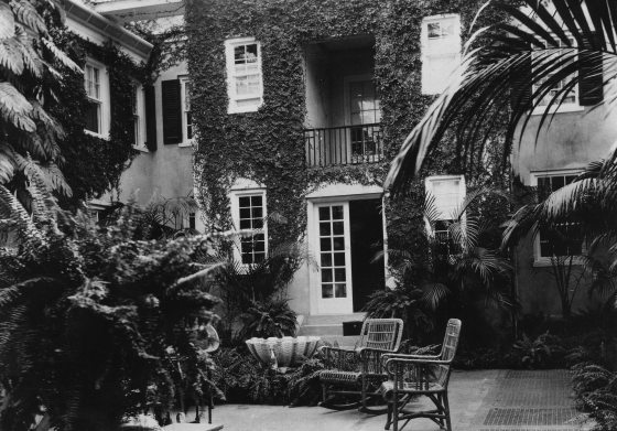 A black and white image of the interior of the Peirce du Pont House at Longwood Gardens.