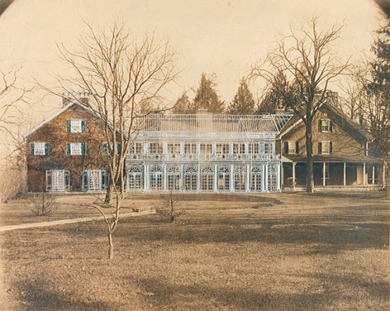 A sepia toned image of the Pierce du Pont House at Longwood Gardens.