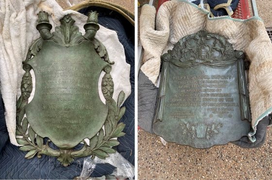 Two side-by-side images of a brone plaque laying on the ground.