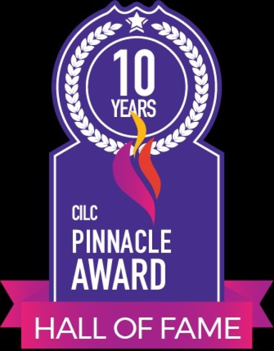 Logo of pink, orange and yellow flames against a purple background with text "CILC Pinnacle Award" and "10 years" in a circle of laurel leaves above, and "Hall of Fame" in a pink banner below.