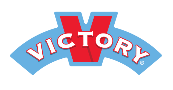 Block letters in white against a light blue arch centered by the "T" in "Victory" and a large red "V" in the background.