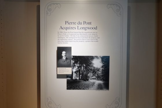 a sign with historic photos from Longwood Gardens 